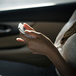 Woman working in a car